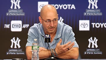 Aug 23, 2023; Bronx, New York, USA; New York Yankees general manager Brian Cashman talks with the media before the game between the Yankees and the Washington Nationals at Yankee Stadium. Mandatory Credit: Vincent Carchietta-Imagn Images