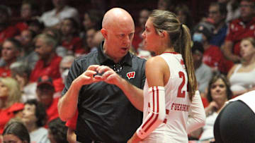 Wisconsin volleyball coach Kelly Sheffield and setter Charlie Fuerbringer talk during a timeout in the Badgers' exhibition match with Bradley on Tuesday Aug. 20, 2024 at the UW Field House in Madison, Wisconsin.