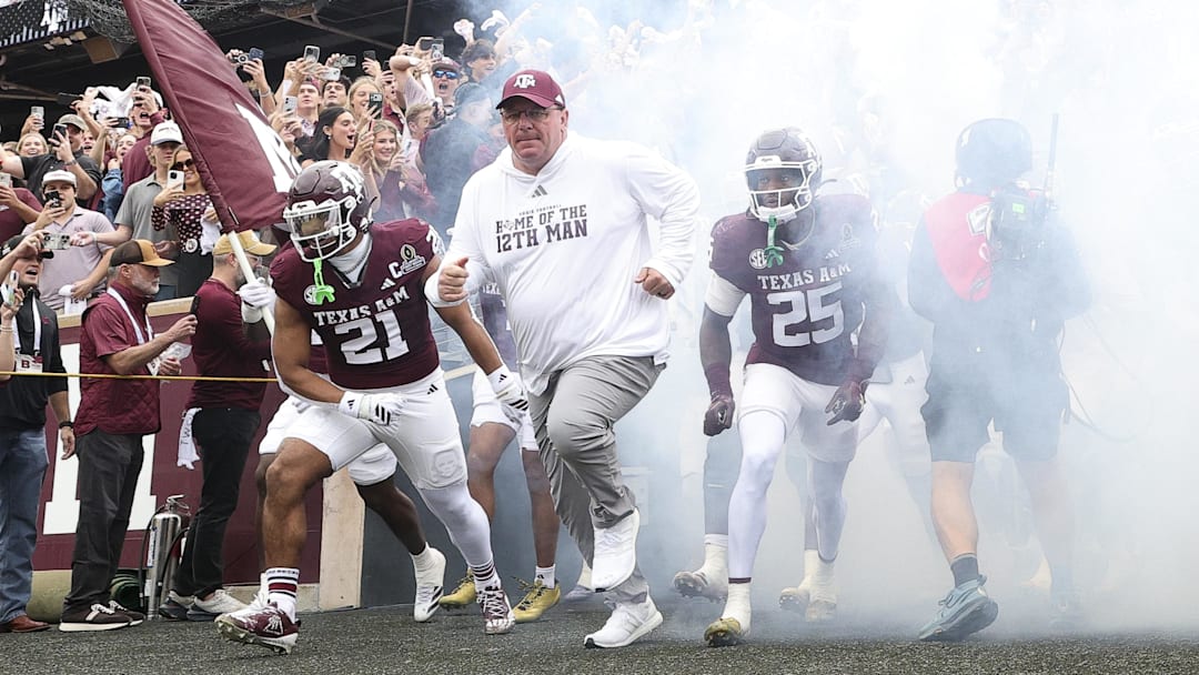 Texas A&M Aggies head coach Mike Elko takes the field prior to the game against the Miami Hurricanes during the first round of the CFP