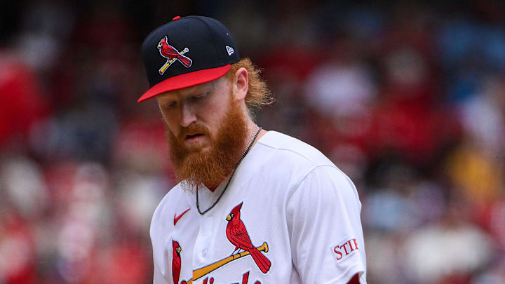 Mar 29, 2026; St. Louis, Missouri, USA; St. Louis Cardinals starting pitcher Dustin May (3) flips the ball out of his glove as he waits for a mound visit during the second inning against the Tampa Bay Rays at Busch Stadium. Mandatory Credit: Jeff Curry-Imagn Images