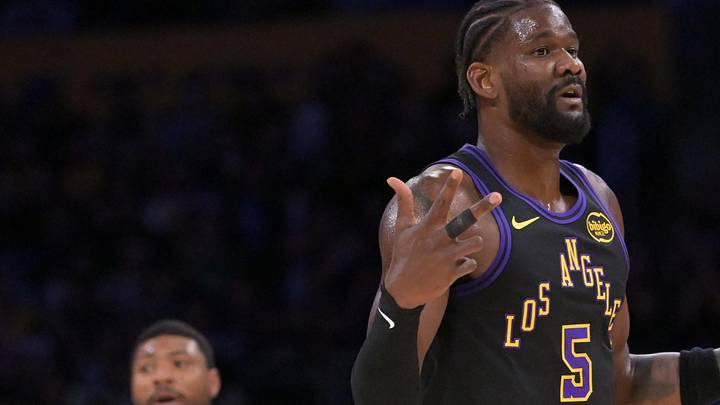 Apr 21, 2026; Los Angeles, California, USA; Los Angeles Lakers center Deandre Ayton (5) reacts on the court after a three-point basket by guard Marcus Smart (36) in the first half of game two of the first round of the 2026 NBA Playoffs against the Houston Rockets at Crypto.com Arena. Mandatory Credit: Jayne Kamin-Oncea-Imagn Images