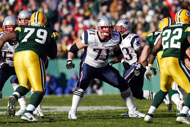 New England Patriots offensive lineman Russ Hochstein blocks after the snap during the gam against the Green Bay Packers.