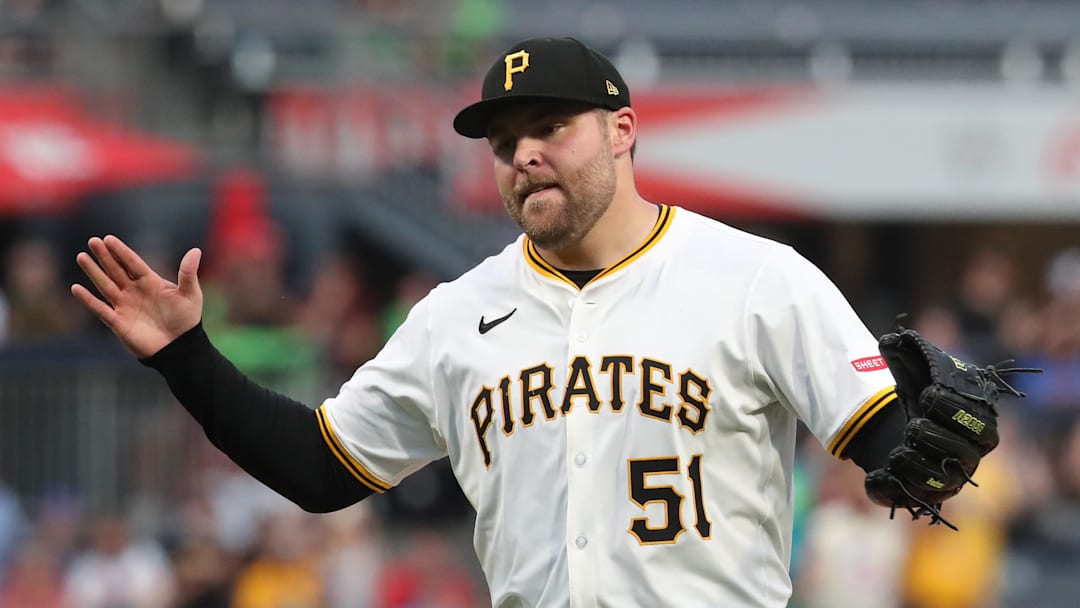 Jun 28, 2025; Pittsburgh, Pennsylvania, USA; Pittsburgh Pirates relief pitcher David Bednar (51) reacts after the final out against the New York Mets during the ninth inning at PNC Park. Mandatory Credit: Charles LeClaire-Imagn Images
