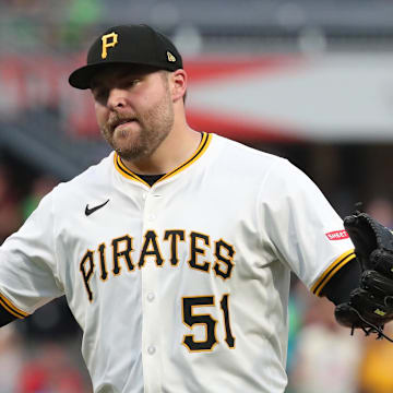 Jun 28, 2025; Pittsburgh, Pennsylvania, USA; Pittsburgh Pirates relief pitcher David Bednar (51) reacts after the final out against the New York Mets during the ninth inning at PNC Park. Mandatory Credit: Charles LeClaire-Imagn Images