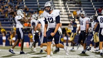 Monmouth quarterback Derek Robertson