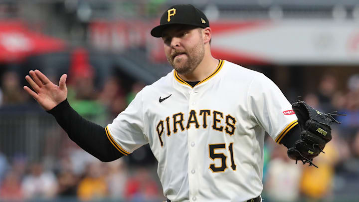 Jun 28, 2025; Pittsburgh, Pennsylvania, USA; Pittsburgh Pirates relief pitcher David Bednar (51) reacts after the final out against the New York Mets during the ninth inning at PNC Park. Mandatory Credit: Charles LeClaire-Imagn Images