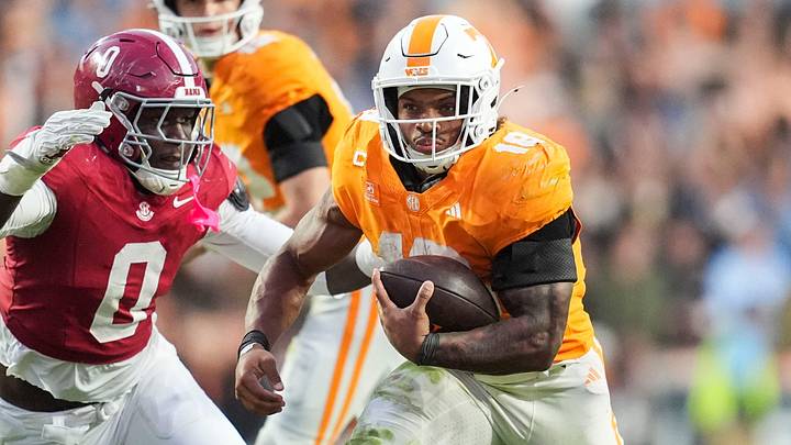 Tennessee running back DeSean Bishop (18) finds a hole during a football game between Tennessee and Alabama at Neyland Stadium in Knoxville, Tenn., on Oct. 17, 2026.
