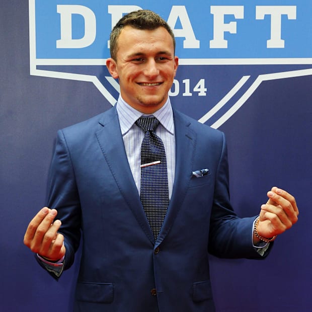 May 8, 2014; New York, NY, USA; Johnny Manziel (Texas A&M) poses for a photo during the NFL Draft red carpet arrivals at 