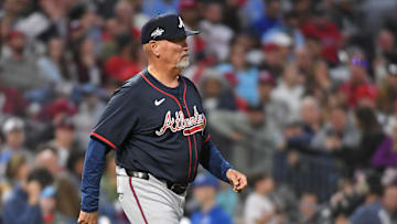 May 27, 2025; Philadelphia, Pennsylvania, USA; Atlanta Braves manager Brian Snitker (43) walks to the mound to make a pitching change during the fifth inning against the Philadelphia Phillies at Citizens Bank Park. Mandatory Credit: Eric Hartline-Imagn Images