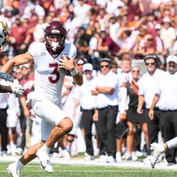 Aug 31, 2024; Nashville, Tennessee, USA;  Virginia Tech Hokies quarterback Collin Schlee (3) runs the ball against the Vanderbilt Commodores during the second half at FirstBank Stadium. Mandatory Credit: Steve Roberts-USA TODAY Sports