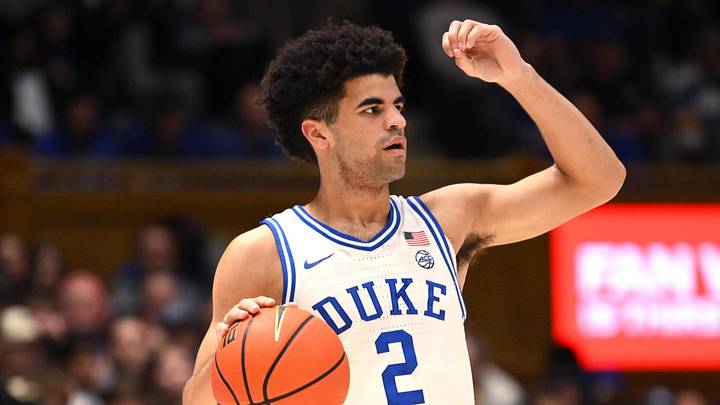 Feb 16, 2026; Durham, North Carolina, USA;  Duke Blue Devils guard Cayden Boozer (2) makes a call during the second half against the Syracuse Orange at Cameron Indoor Stadium. Mandatory Credit: Zachary Taft-Imagn Images