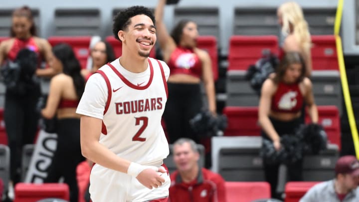 Feb 15, 2024; Pullman, Washington, USA; Washington State Cougars guard Myles Rice (2) cracks a smile after a score against the California Golden Bears in the second half at Friel Court at Beasley Coliseum. Washington State Cougars won 84-65. Mandatory Credit: James Snook-USA TODAY Sports