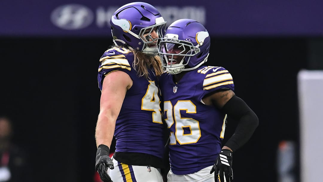 Jan 4, 2026; Minneapolis, Minnesota, USA; Minnesota Vikings linebacker Andrew van Ginkel (43) and Minnesota Vikings safety Theo Jackson (26) celebrate after a play against the Green Bay Packers during the third quarter at U.S. Bank Stadium.