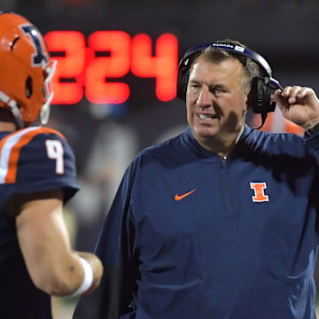 Sep 13, 2025; Champaign, Illinois, USA;  Illinois Fighting Illini head coach Bret Bielema and quarterback Luke Altmyer (9) during the second half against the Western Michigan Broncos at Memorial Stadium. Mandatory Credit: Ron Johnson-Imagn Images