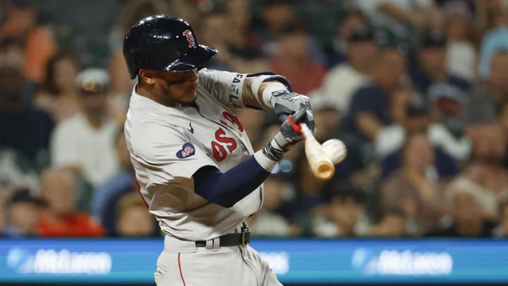 Aug 30, 2024; Detroit, Michigan, USA;  Boston Red Sox shortstop Ceddanne Rafaela (43) hits a two run home run tenth inning against the Detroit Tigers at Comerica Park. Mandatory Credit: Rick Osentoski-USA TODAY Sports