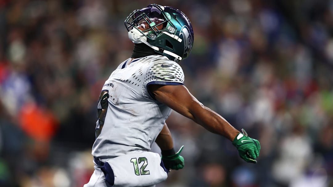 Dec 18, 2025; Seattle, Washington, USA; Seattle Seahawks running back Kenneth Walker III (9) reacts after a first down against the Los Angeles Rams in the first half at Lumen Field.