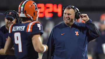 Sep 13, 2025; Champaign, Illinois, USA;  Illinois Fighting Illini head coach Bret Bielema and quarterback Luke Altmyer (9) during the second half against the Western Michigan Broncos at Memorial Stadium. Mandatory Credit: Ron Johnson-Imagn Images
