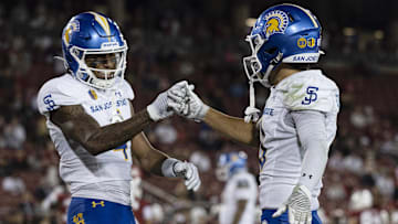 Sep 27, 2025; Stanford, California, USA;  San Jose State Spartans wide receiver Kyri Shoels (4) celebrates with wide receiver Danny Scudero (10) during the fourth quarter against the Stanford Cardinal at Stanford Stadium. Mandatory Credit: Stan Szeto-Imagn Images