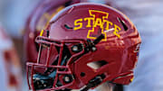 Nov 9, 2024; Kansas City, Missouri, USA; Iowa State Cyclones helmets on the bench during the first quarter against the Kansas Jayhawks at GEHA Field at Arrowhead Stadium. 