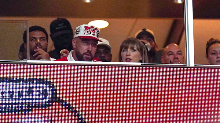 Travis Kelce and Taylor Swift watch the Cincinnati Bearcats and Nebraska Cornhuskers game at Arrowhead Stadium. 