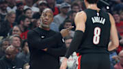 Oct 22, 2025; Portland, Oregon, USA;  Portland Trail Blazers head coach Chauncey Billups talks with Portland Trail Blazers forward Deni Avdija (8) in a game against the Minnesota Timberwolves at Moda Center. Mandatory Credit: Jaime Valdez-Imagn Images