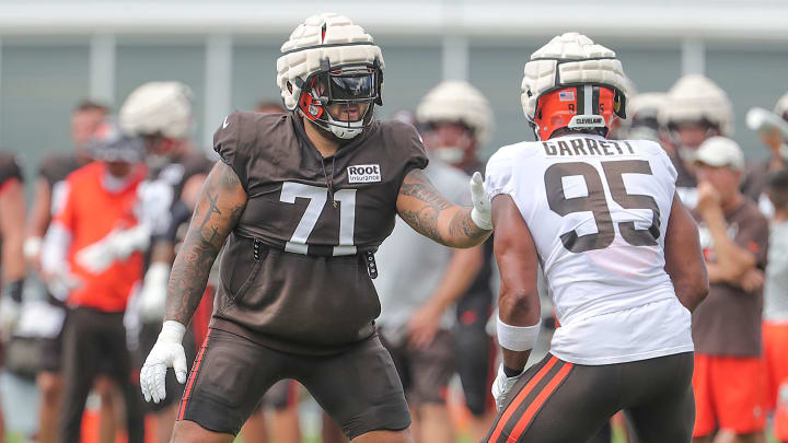 Cleveland Browns left tackle Jedrick Wills Jr. has the task of blocking defensive end Myles Garrett during training camp on Friday, Aug. 5, 2022 in Berea.