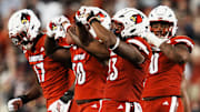 Louisville Cardinals defensive lineman Wesley Bailey (23) makes a heart gesture after his sack against James Madison University in the Card's football game Friday September 5, 2025 at L&N Credit Union Stadium in Louisville, Kentucky. After the game, Bailey said he always does a heart sign after a sack as an honor to his late mother, who was killed when he was five years old. Other Card players have followed his lead.