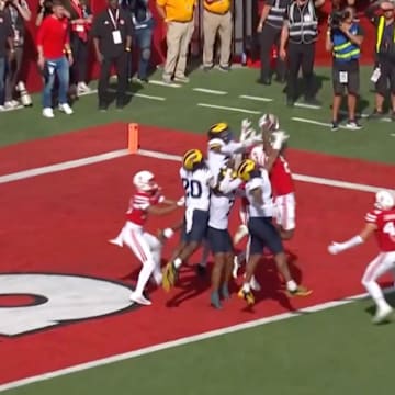 Nebraska's Jacory Barnes Jr. caught a Hail Mary pass against Michigan to tie the game at halftime. 