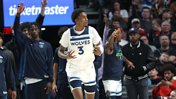 Oct 22, 2025; Portland, Oregon, USA; Minnesota Timberwolves forward Jaden McDaniels (3) reacts after scoring a three-point shot against the Portland Trail Blazers  in the second half at Moda Center. Mandatory Credit: Jaime Valdez-Imagn Images