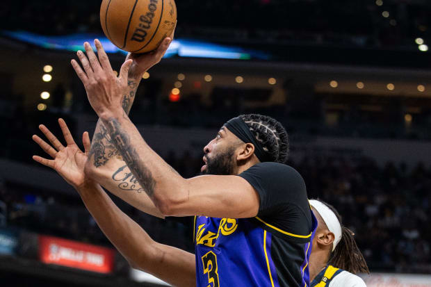 Mar 29, 2024; Indianapolis, Indiana, USA; Los Angeles Lakers forward Anthony Davis (3) shoots the