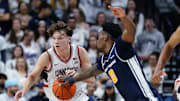 Dec 5, 2025; Storrs, Connecticut, USA; East Texas A&M Lions forward Ronnie Harrison (0) strips the ball from UConn Huskies guard Braylon Mullins (24) in the second half at Harry A. Gampel Pavilion. Mandatory Credit: David Butler II-Imagn Images