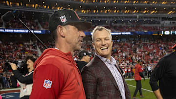 San Francisco 49ers head coach Kyle Shanahan (L) and general manager John Lynch (R)