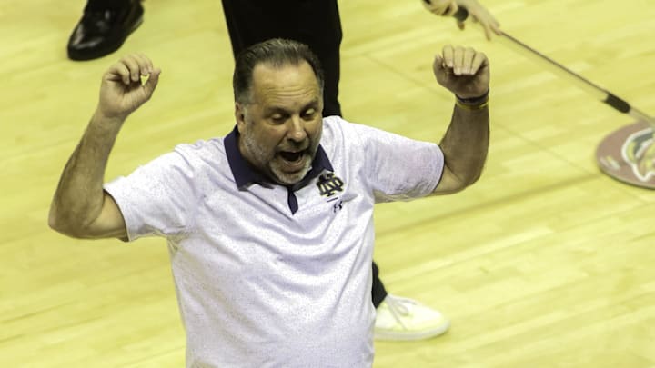 Dec 21, 2022; Tallahassee, Florida, USA; Notre Dame head coach Mike Brey talks to team members during the first half against the Florida State Seminoles at Donald L. Tucker Center. 