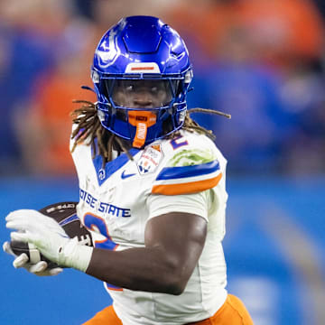 Dec 31, 2024; Glendale, AZ, USA; Boise State Broncos running back Ashton Jeanty (2) against the Penn State Nittany Lions during the Fiesta Bowl at State Farm Stadium. Mandatory Credit: Mark J. Rebilas-Imagn Images