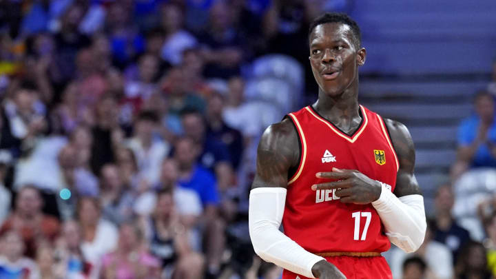 Jul 30, 2024; Villeneuve-d'Ascq, France; Germany point guard Dennis Schroder (17) reacts after making a three pointer against Brazil in men’s basketball group B play during the Paris 2024 Olympic Summer Games at Stade Pierre-Mauroy. Mandatory Credit: John David Mercer-USA TODAY Sports