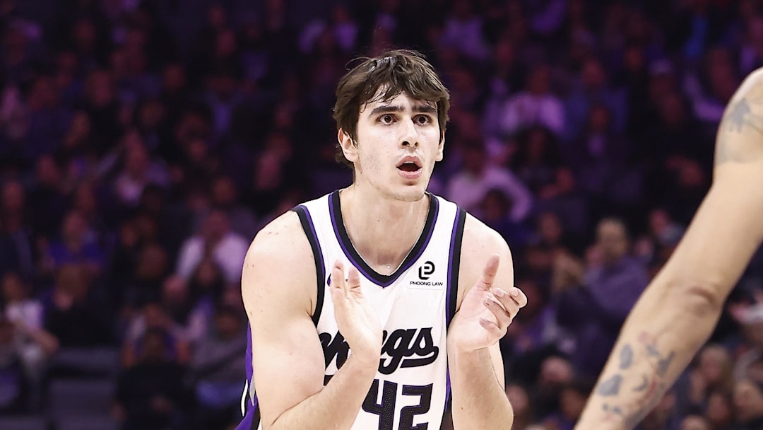 Nov 30, 2025; Sacramento, California, USA; Sacramento Kings center Maxime Raynaud (42) claps towards guard Nique Clifford (5) at the end of the first quarter against the Memphis Grizzlies at Golden 1 Center.