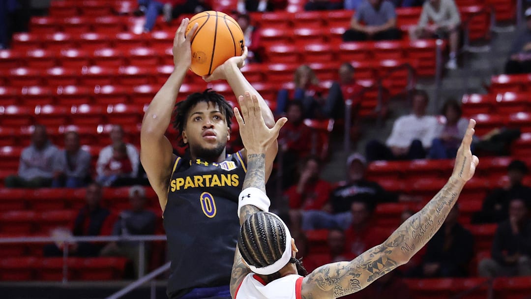 Nov 3, 2025; Salt Lake City, Utah, USA; San Jose State Spartans guard Colby Garland (0) shoots over Utah Utes guard Terrence Brown (2) during the first half at Jon M. Huntsman Center. Mandatory Credit: Rob Gray-Imagn Images Nov 3, 2025; Salt Lake City, Utah, USA; San Jose State Spartans guard Colby Garland (0) shoots over Utah Utes guard Terrence Brown (2) during the first half at Jon M. Huntsman Center. Mandatory Credit: Rob Gray-Imagn Images
