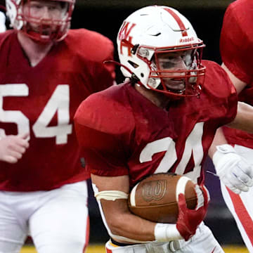 West Hancock Gustavo Gomez (24) carries the ball against Tri-Center during the Iowa high school Class A championship Thursday, Nov. 21, 2024 at the UNI-Dome in Cedar Falls, Iowa.