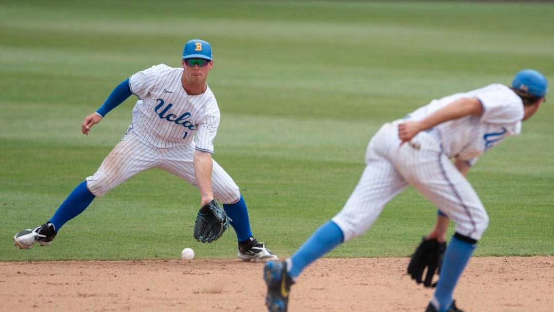 UCLA Bruins infielder Cody Schrier (1) scoops up a ground ball during the NCAA regional baseball tournament at Plainsman Park in Auburn, Ala., on Friday, June 3, 2022. Florida State Seminoles defeated UCLA Bruins 5-3.