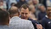 Duke basketball head coach Jon Scheyer versus UNC