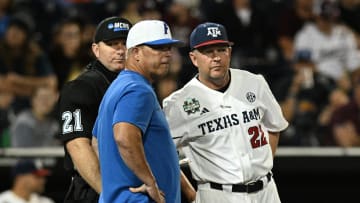 Jun 15, 2024; Omaha, NE, USA;  Texas A&M Aggies head coach Schlossnagle and Florida Gators head coach Kevin O'Sullivan meet before the game at Charles Schwab Field Omaha. Mandatory Credit: Steven Branscombe-USA TODAY Sports