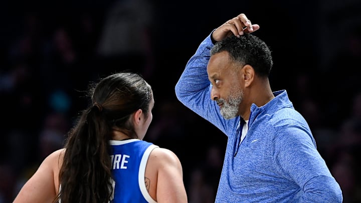 Kentucky head coach Kenny Brooks talks with guard Georgia Amoore (3) during an NCAA college basketball game Sunday, Jan. 5, 2025, in Nashville, Tenn.
