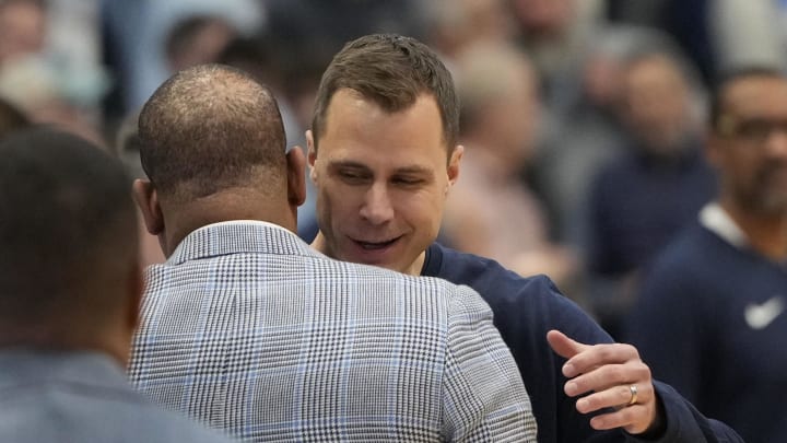 UNC basketball head coach Hubert Davis and Duke's Jon Scheyer