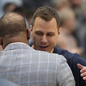 Duke basketball head coach Jon Scheyer versus UNC