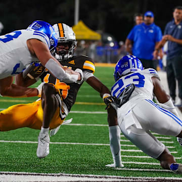 Sep 14, 2024; Laramie, Wyoming, USA; Wyoming Cowboys wide receiver Chris Durr Jr. (15) runs against the Brigham Young Cougars during the fourth quarter at Jonah Field at War Memorial Stadium.