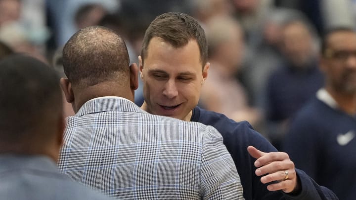 UNC basketball head coach Hubert Davis and Duke's Jon Scheyer