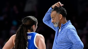 Kentucky head coach Kenny Brooks talks with guard Georgia Amoore (3) during an NCAA college basketball game Sunday, Jan. 5, 2025, in Nashville, Tenn.