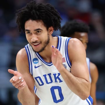 Mar 31, 2024; Dallas, TX, USA; Duke Blue Devils guard Jared McCain (0) reacts in the first half against the North Carolina State Wolfpack in the finals of the South Regional of the 2024 NCAA Tournament at American Airline Center. Mandatory Credit: Kevin Jairaj-USA TODAY Sports