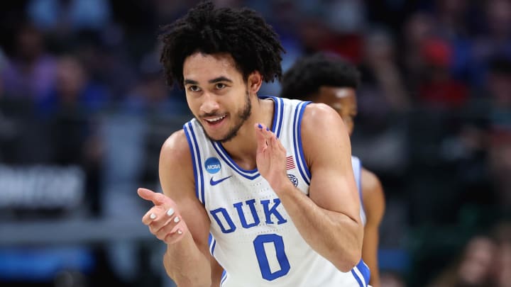 Mar 31, 2024; Dallas, TX, USA; Duke Blue Devils guard Jared McCain (0) reacts in the first half against the North Carolina State Wolfpack in the finals of the South Regional of the 2024 NCAA Tournament at American Airline Center. 