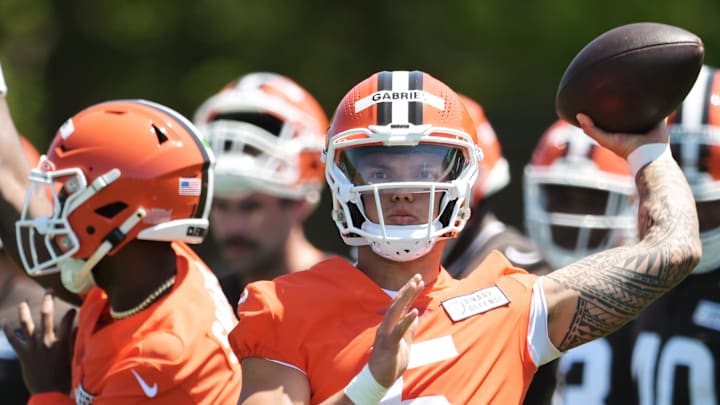 May 10, 2025; Berea, OH, USA; Cleveland Browns quarterback Dillon Gabriel (5) and quarterback Shedeur Sanders (12) throw passes during rookie minicamp at CrossCountry Mortgage Campus. Mandatory Credit: Ken Blaze-Imagn Images May 10, 2025; Berea, OH, USA; Cleveland Browns quarterback Dillon Gabriel (5) and quarterback Shedeur Sanders (12) throw passes during rookie minicamp at CrossCountry Mortgage Campus. Mandatory Credit: Ken Blaze-Imagn Images